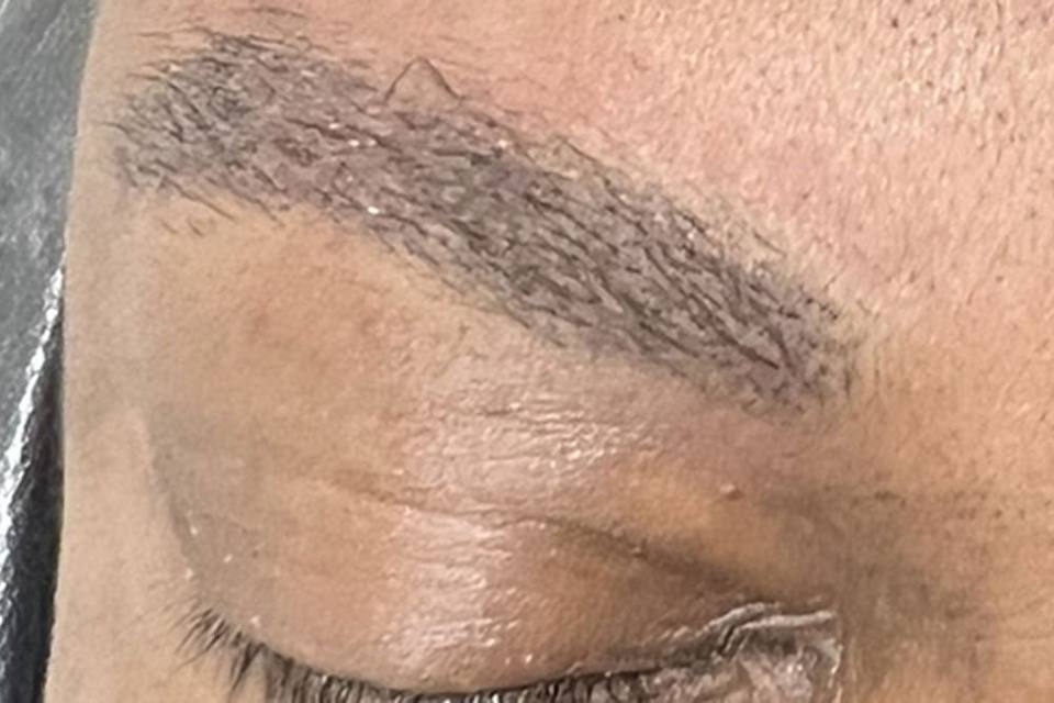 Man with microshaded permanent eyebrows